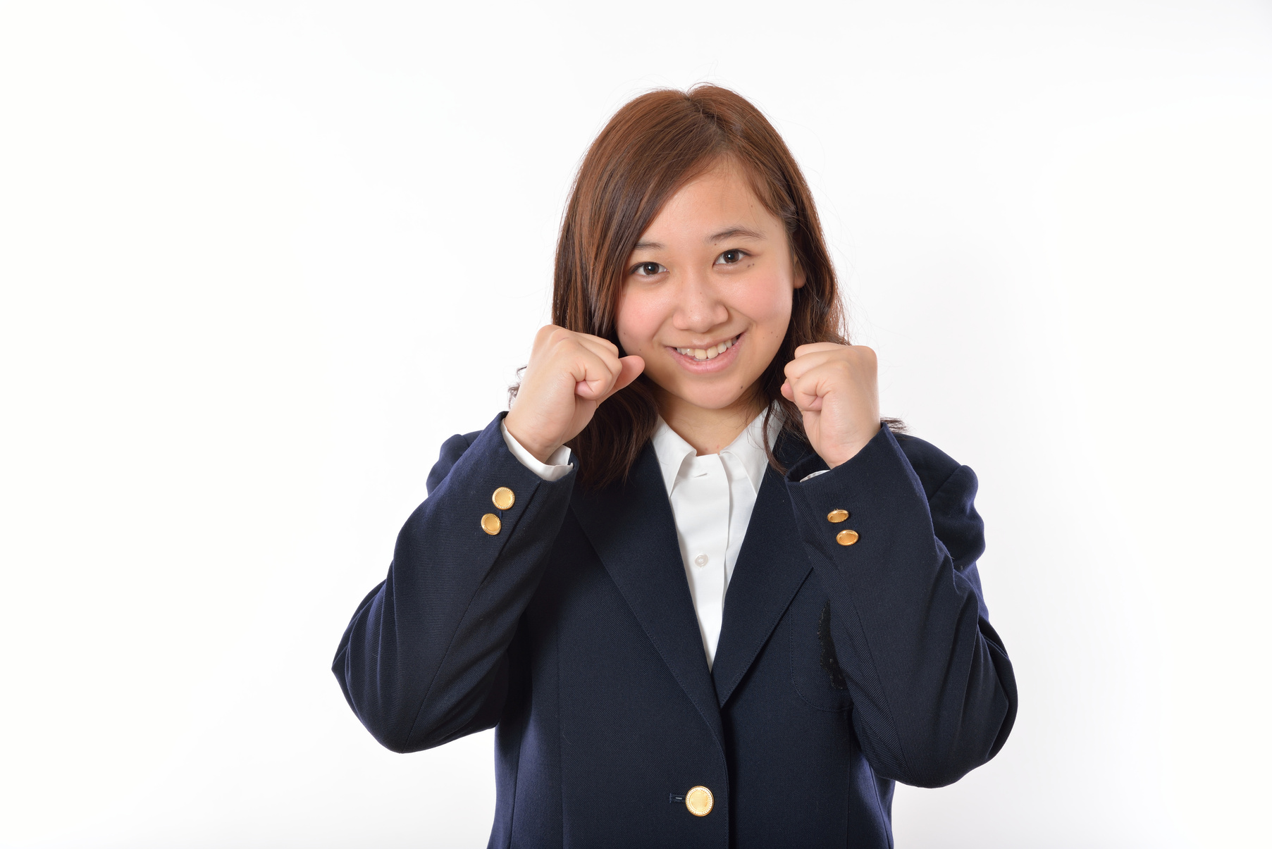 Japanese high school student girl is showing fighting pose